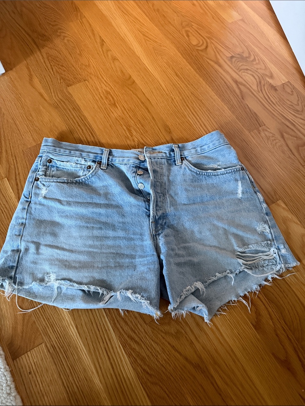 Agolde Light Wash Distressed Denim Shorts